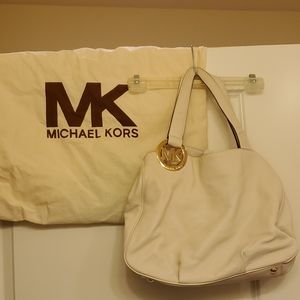 Gently used Original MK Micheal Kors purse.